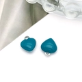 Close-up of heart-shaped pendants with teal enamel and stainless steel loops for DIY jewelry - 8X9mm-0.34g / Blue-Green - Silver Edge