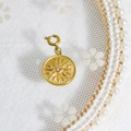 Golden round sunburst pendant with crystal on lace, stainless steel jewelry charm - Sunburst Zircon Medallion