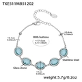 Silver stainless steel bracelet with five blue oval glass stones and size details - Steel Bracelet - Lake Blue Glass Stone