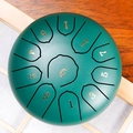 Green steel tongue drum with numbered notes and central decorative lotus symbol - Stone Green - Panda (6 Inch 11 Notes)