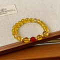 Elegant fluorite beaded bracelet with translucent yellow beads and a red accent stone - 30# Yellow Cylinder