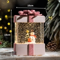 Pink Christmas water globe music box with snowman and golden glitter swirl light - Pink Gift Box Christmas Snowman