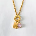 Gold-plated stainless steel necklace with letter X tag and pink crystal pendant - Letter X