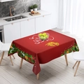 Close-up of red Christmas tablecloth with Merry Christmas text and golden bells on wood table - TQZB02-6 Red Artistic Text