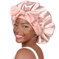 Pink satin hair bonnet with oversized bow for night hair care and beauty protection - One Size / Rose Pink