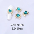Detail of golden bow nail art charms with blue heart crystal inlay, 12x10mm size - Gold Base Dark Blue Heart (9466)