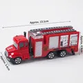 Red alloy fire truck toy model with fire rescue decals and extendable ladder detail - Red Fire Rescue Truck