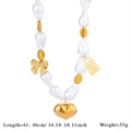 Collana di perle barocche con grande pendente a cuore dorato e dettaglio fiocco - Stile 1 (Cuore Perla Barocca)