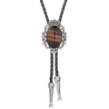 Detailed close-up of Western bolo tie with crown motif and brown tiger eye stone - Tiger's Eye