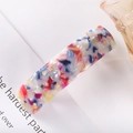 Detail of a rectangular acetate hair clip featuring colorful marbled textures and patterns - 10# Spring Clip (Multicolor Terrazzo)