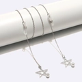 Silver star pendant eyewear chain with pearls and silicone loops on white display - Star Pearl
