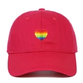 Detailed close-up of rainbow heart embroidery on bright red cotton twill baseball cap - Rose Red