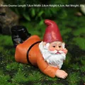 Lying garden gnome figurine with red hat and orange shirt, size 7.8x3.8x4.3cm resin ornament - Prone Gnome
