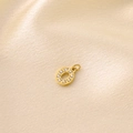 Gold plated letter O pendant with cubic zirconia inlay on elegant silk fabric background - Letter O / Gold