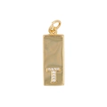 Detail of gold rectangular pendant with Zircon letter T on polished surface - Letter T