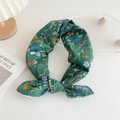Green floral cotton scarf headband with vibrant blue and purple flowers on white background - Elegant Green Floral
