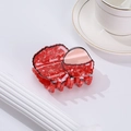 Red strawberry fruit claw clip with textured finish and black seeds for hair styling - Opened Lychee