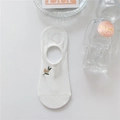 Detail of white cotton invisible sock featuring a delicate small plant embroidery - One Size / Loquat Embroidery