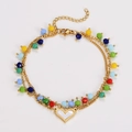 Detailed view of a golden double-layered bracelet with colorful beads and a heart pendant - Bracelet