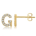 Macro view of gold plated brass letter G stud earrings with white cubic zirconia stones - Style G