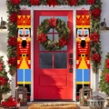 Detail of Nutcracker soldier Christmas porch banners with wreaths on red doors - 181.5x29.5cm (Pair) / Red & Blue