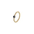 Detailed close-up of golden beaded elastic ring featuring a central black zircon gemstone - Single Black Ring