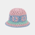 Close-up of crochet hollow flower patterns on a colorful knit bucket hat for women - One Size / Mixed Pink