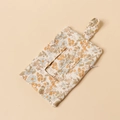 Detailed close-up of a floral cotton bedside hanging storage bag with zipper and button strap - Yellow Blue Floral