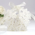 Elegant laser-cut white wedding favor box with butterfly design and satin ribbon - Ivory/White Jade Star