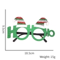 Close-up of green glitter HO HO HO Christmas glasses frame with mini Santa hats - Green Long Santa Hat