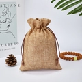 Natural linen drawstring pouch in brown for jewelry storage with textured fabric - 7*9cm / Medium Coffee