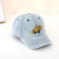 Detailed close-up of yellow excavator embroidery on light blue denim kids baseball cap - 52cm (2-6 Years) / Light Blue