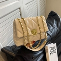 Quilted crossbody bag in beige with gold chain strap and turn-lock closure - Beige
