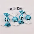 Detailed view of four 10cm blue metallic Christmas candy cane ornaments with white glitter - Set 11 (Blue & White Candy 10cm - 4pcs)