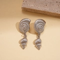 Silver nautilus shell drop earrings with textured metal finish on a minimalist stone base - Silver