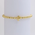 Fashionable gold beaded bracelet set featuring a metallic letter P pendant for women - Gold P
