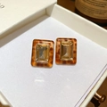 Detail of amber resin rectangular stud earrings with a clear faceted gemstone center - Tortoiseshell-Rectangular Clear Gem (57#)
