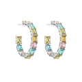 Macro detail of C-shaped silver earrings with multicolor cubic zirconia stones - Hoop Earrings / Platinum
