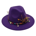 Detail of dark purple fedora hat with ethnic beads and shells on a leather band - Deep purple