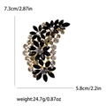 Vintage gold-tone flower brooch with black and clear crystals, 7.3cm x 5.8cm size - Black