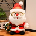 Peluche di Babbo Natale con occhiali dorati e ghirlanda verde per decoro natalizio - Stile Corona