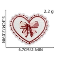 Detail of heart embroidery patch with pink bow and dimensions of 6.7cm by 5.3cm - Wavy Edge Heart Bow