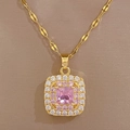 Detail of gold square pendant featuring a pink center stone and crystal border - Pink Gold Necklace (D121)