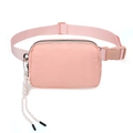 Pink waterproof nylon waist bag with adjustable strap and top zipper closure - Pink