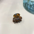 Close-up of a mini amber tortoise shell hair claw clip with France Handmade lettering - 2.6cm / Blue Tortoise