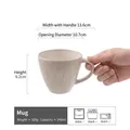 Cream-white retro ceramic mug with vertical stripes, 340ml capacity shown in hand - Tree Pattern - White (Minor Flaw)