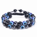 Close-up of double-layer woven bracelet with tiger eye beads and evil eye charm detail - Hematite with Black Beads and Evil Eye Bracelet