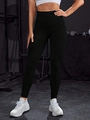 Dettaglio dei leggings neri a vita alta senza cuciture con tessuto tecnico traspirante - S / Nero