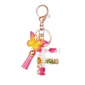 Resin letter F keychain with dried flowers, gold foil, pink tassel and butterfly charm - Flower Pattern F