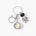 Detailed silver astronaut keychain featuring a double-sided solar system planet pendant - Colorful Starry Sky-9